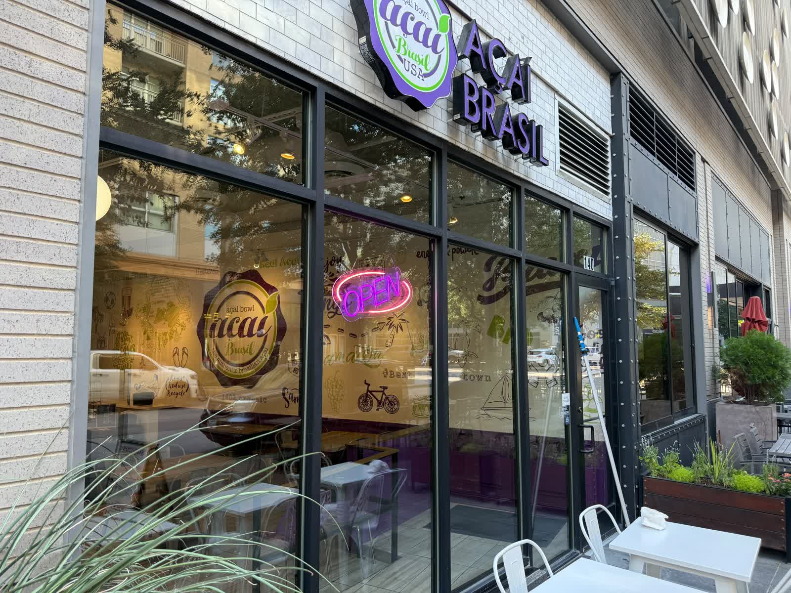 Visual reference of a commercial storefront with wide glass