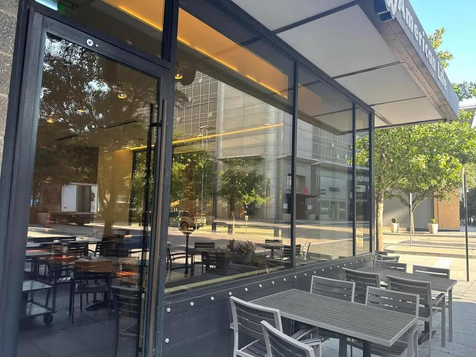 Real commercial facade cleaned by Eco Cleaning Window Services